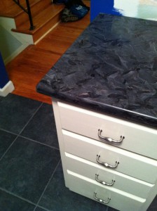 We now have fancy granite countertops and ceramic tile.